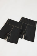 Two black Embodie Renew Shorts shown together, featuring the high-rise waistband and supportive fit.